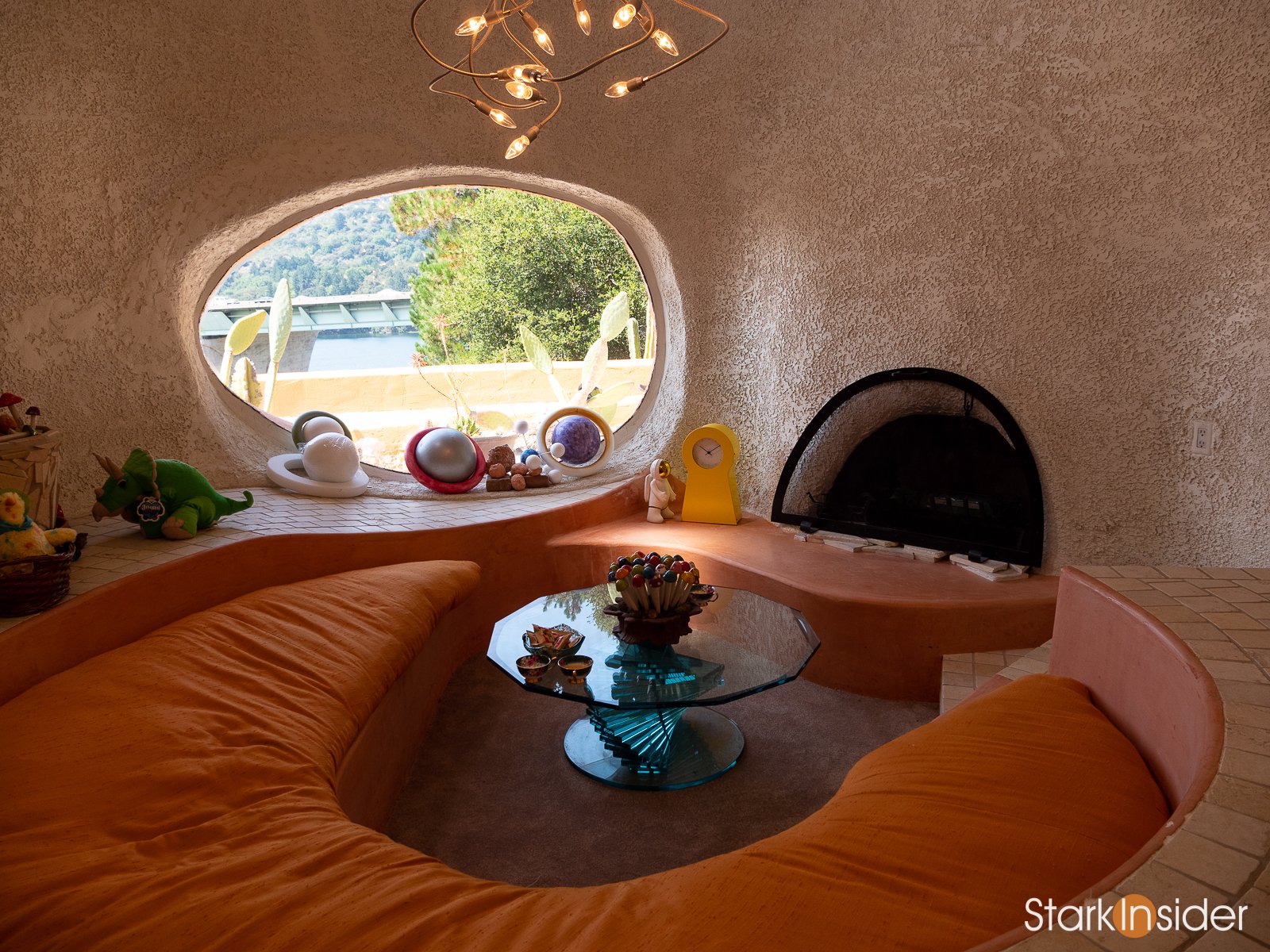 Flintstone House exterior with colorful dinosaur sculptures - Hillsborough, California