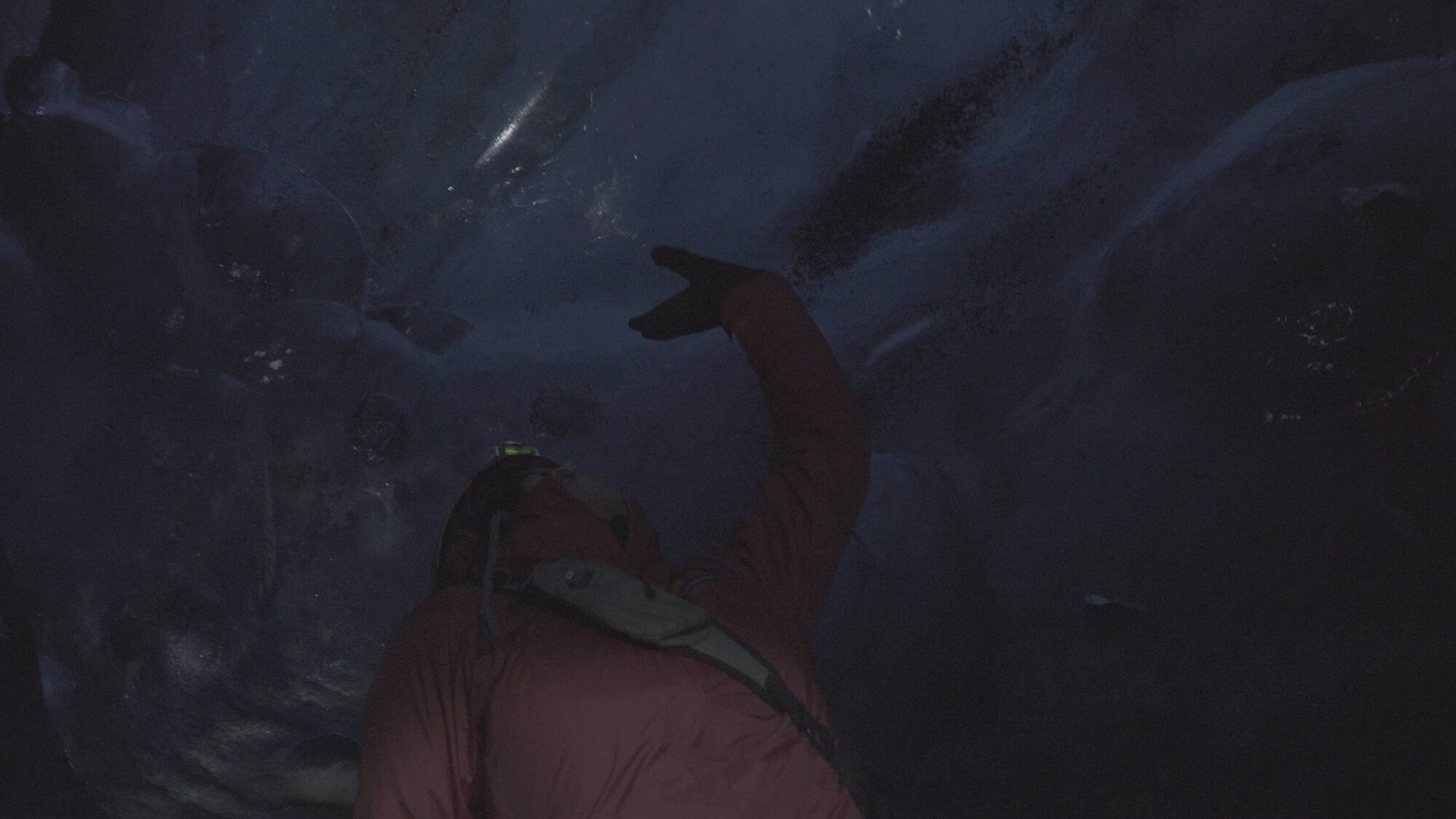 Loni touching glimmering ice surfaces